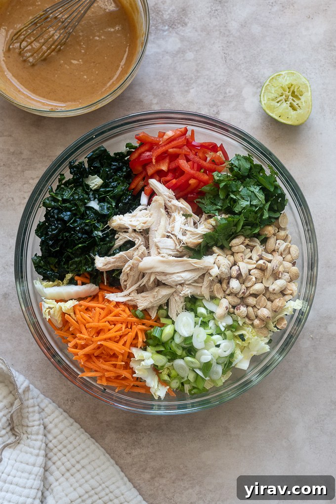 Thai peanut salad ingredients in a mixing bowl.