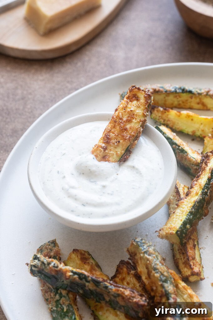 Crispy Air Fried Zucchini Sticks 10 Air fryer zucchini fries with no breadcrumbs dipped in Greek yogurt ranch.