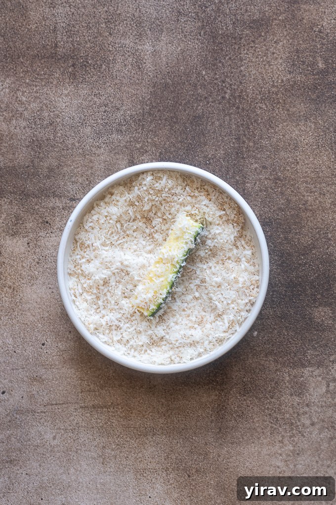 Crispy Air Fried Zucchini Sticks 7 Zucchini fries dipped in parmesan cheese and seasoning.