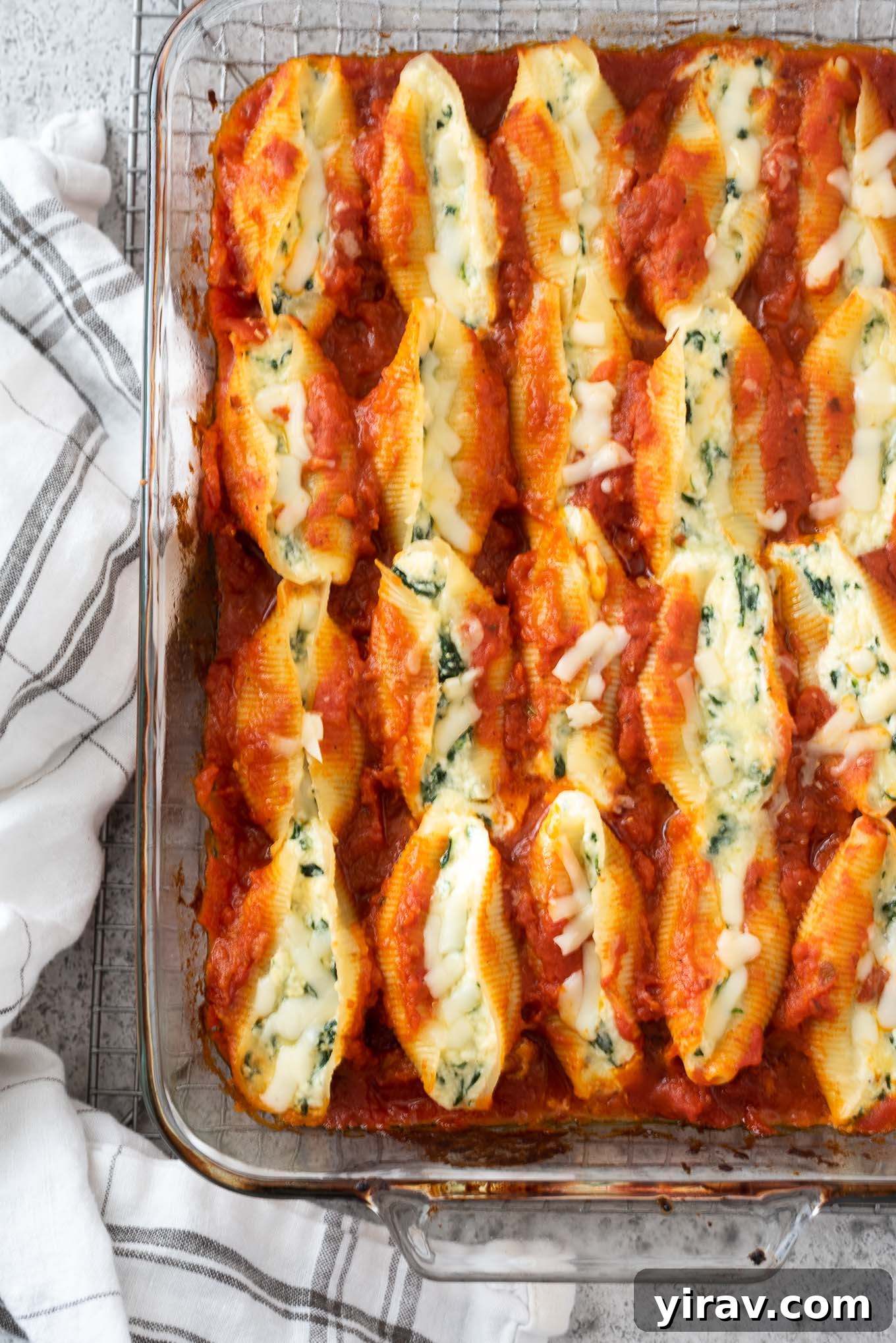 Spinach and ricotta stuffed shells in baking dish
