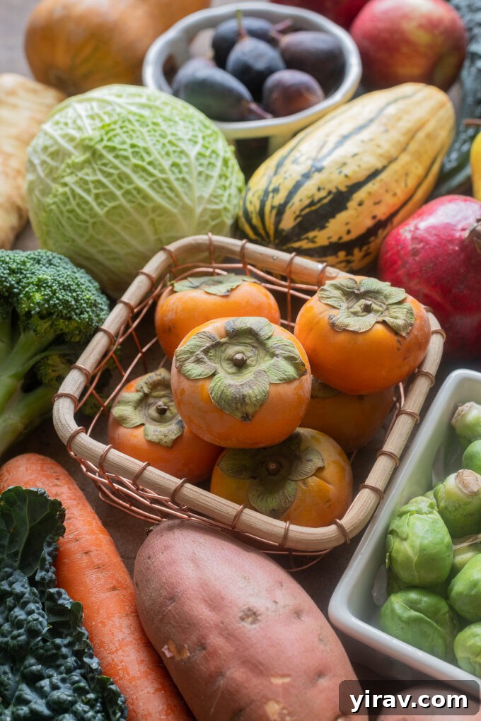 Fruits and vegetables in season in October, including persimmon and winter squash.