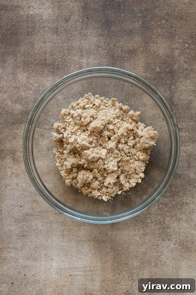 Golden Crumb Apple Pie Bars 5 Prepared shortbread crust and crumble for apple pie bars recipe.