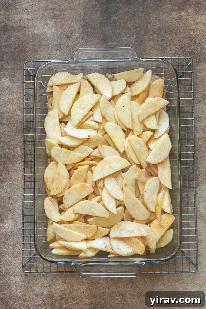 Golden Crumb Apple Pie Bars 6 Place apple filling over baked shortbread crust for apple pie bars.