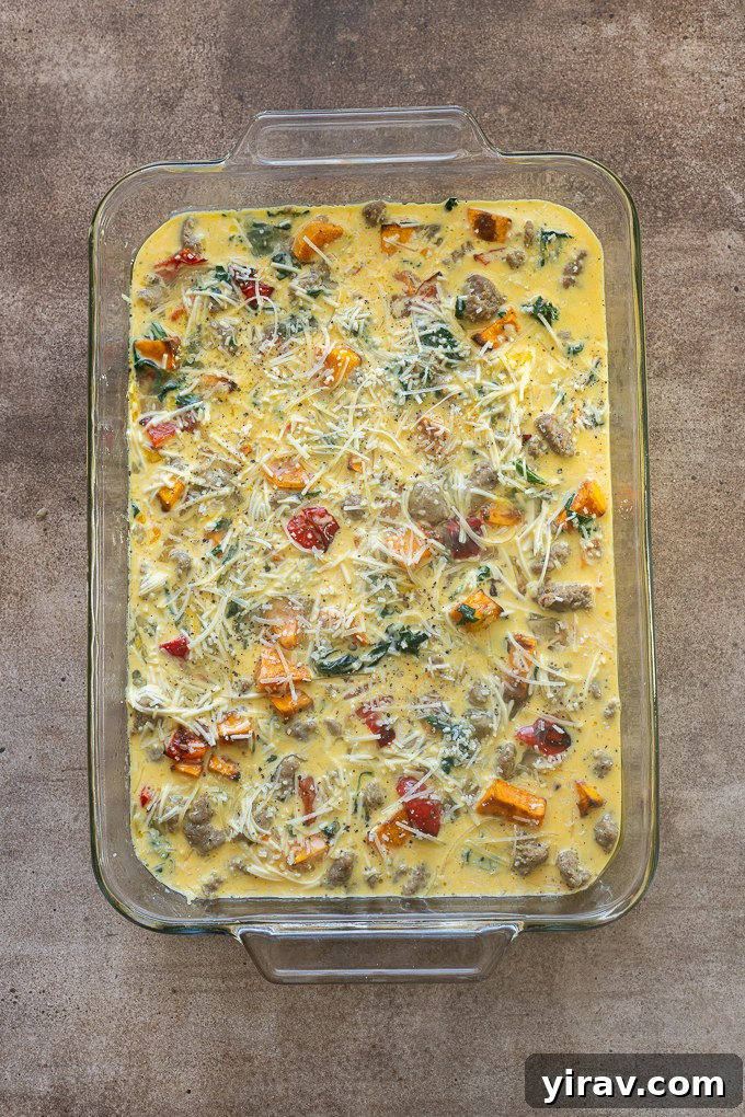 Sausage and egg breakfast casserole before baking.