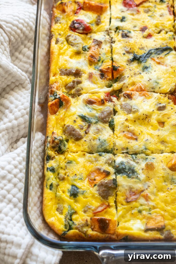 Casserole with breakfast sausage cut in a baking dish.