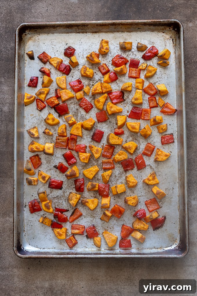 Roasted sweet potato and red bell pepper for breakfast sausage casserole.