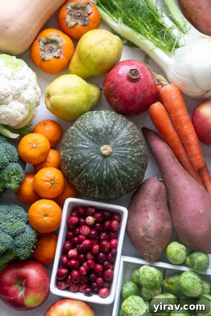 December seasonal produce guide featuring an array of colorful winter fruits and vegetables like squash, pomegranates, and root vegetables.