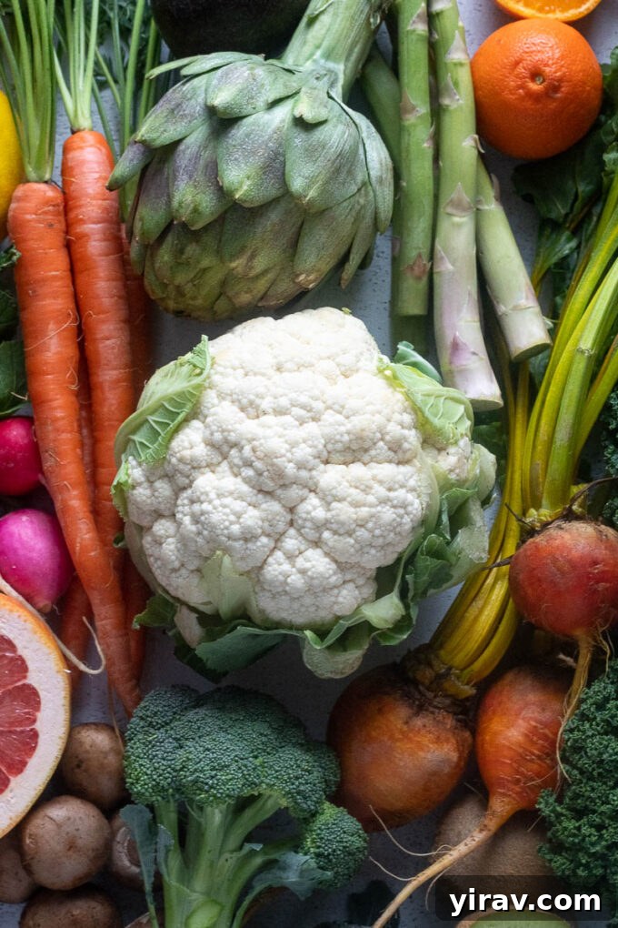 A diverse selection of cruciferous vegetables, including broccoli, cauliflower, and cabbage, showcasing variety for storage tips.