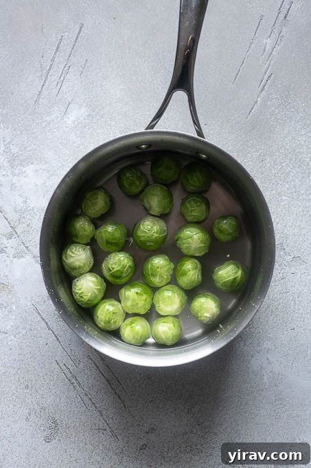 Boil the brussels sprouts until just tender.
