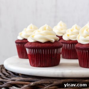 Red velvet cupcakes on a pedestal server