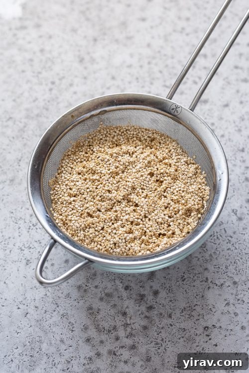 quinoa in fine mesh strainer