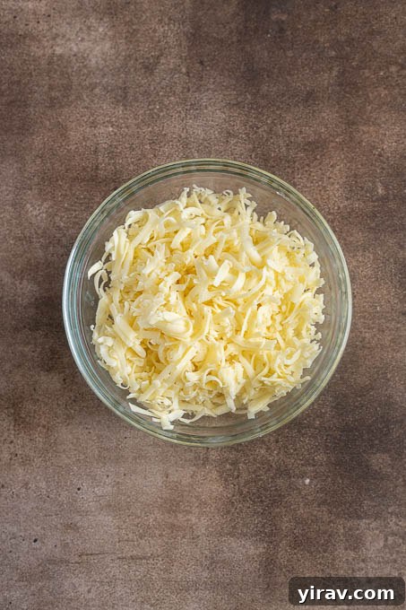 Artisan Cheddar Pub Spread 5 Grated white cheddar cheese for pub cheese.