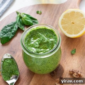 Vibrant Spinach Pesto 7 Spinach pesto in a jar with olive oil on top