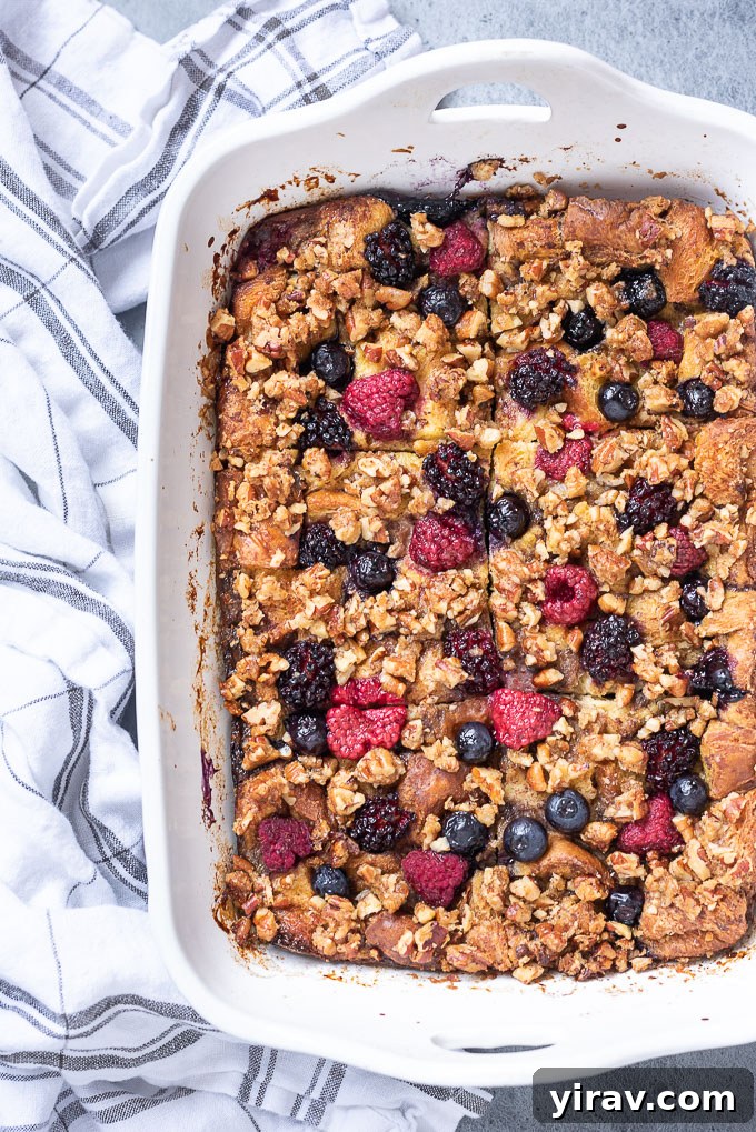 Overnight french toast casserole cut into squares in baking dish