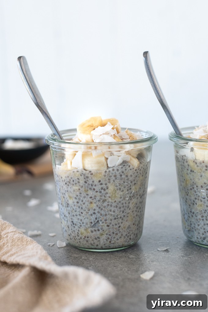 A charming close-up of banana chia pudding served in a jar with a spoon, ready to be enjoyed as a healthy breakfast or dessert.