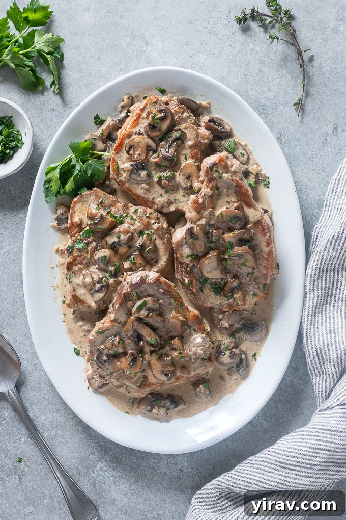 Mushroom pork chops on a serving platter