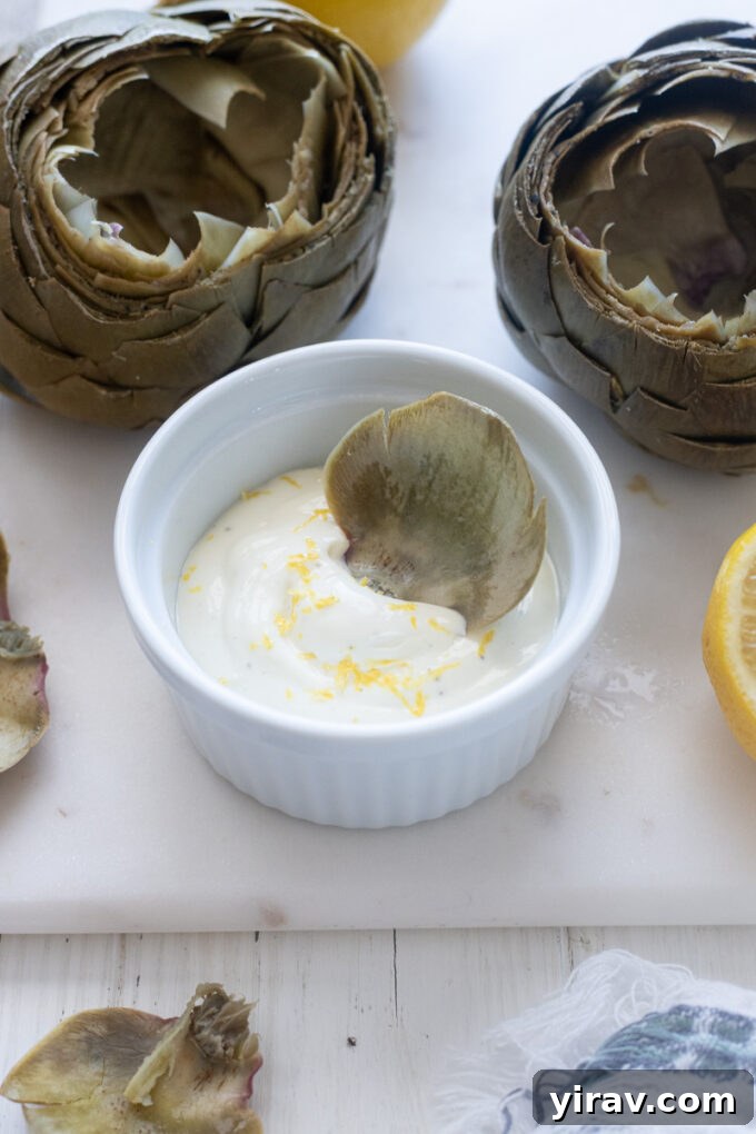 Artichoke leaf dunked in lemon garlic aioli.