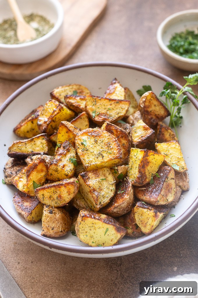 Ranch potatoes in a bowl garnished with parsley.