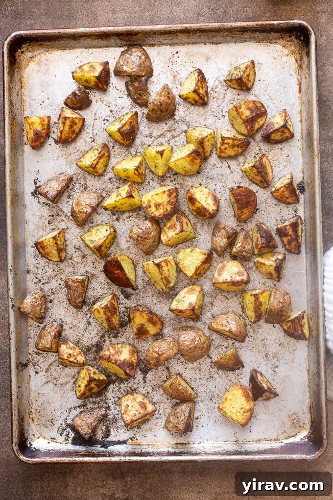 Crispy ranch roasted potatoes on a baking sheet.