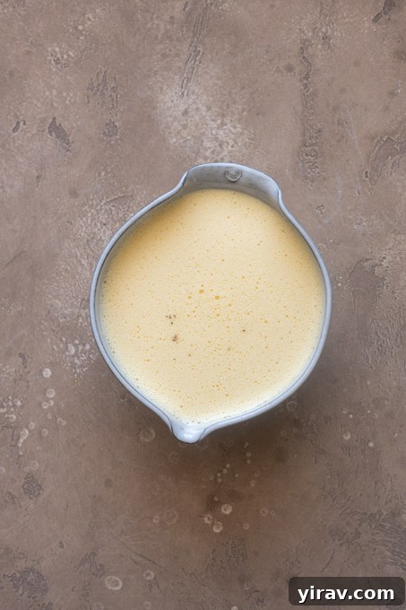 Blended egg and cottage cheese mixture in bowl.