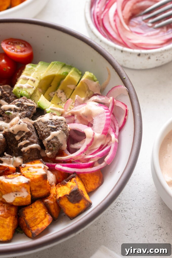 How to Make Quick Tangy Pickled Red Onions in 15 Minutes 13 Pickled red onions in a burger bowl.