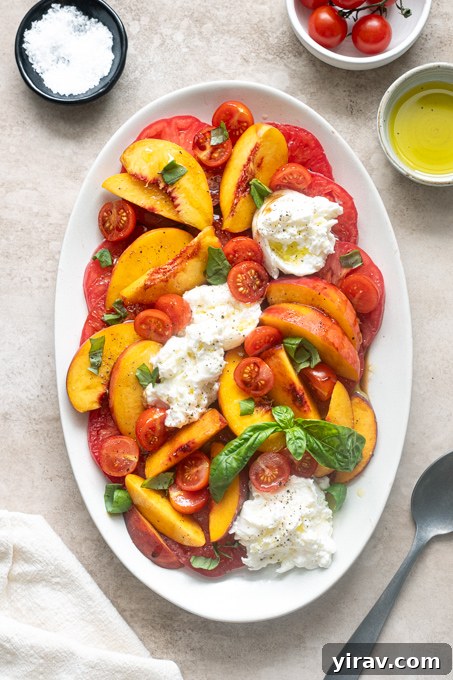 Tomato and Peach Burrata Salad Recipe 8 Finished tomato peach burrata salad with basil, olive oil and balsamic glaze.