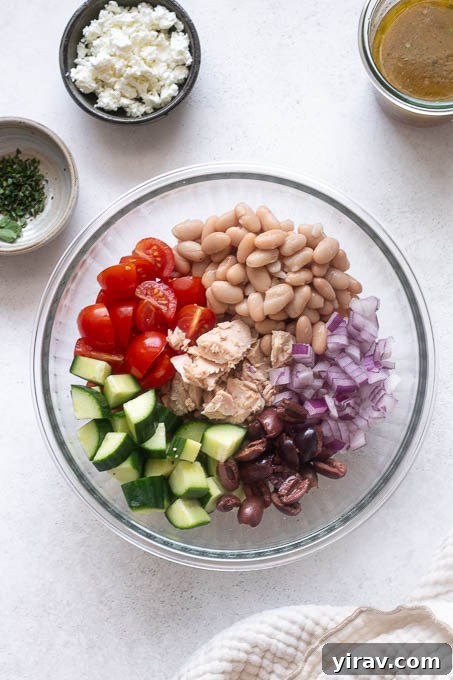 Mediterranean Tuna and White Bean Salad with Lemon Dressing 5 Tuna white bean salad recipe ingredients in a mixing bowl.
