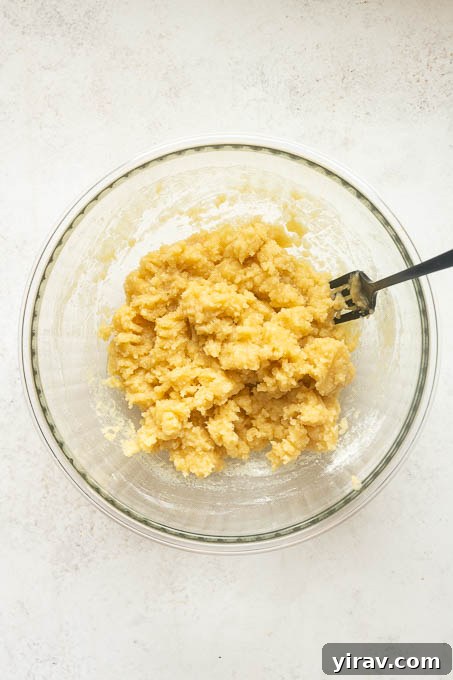 Fresh Peach Cobbler Recipe with Golden Biscuit Topping 5 Shortbread-style peach cobbler topping prepared with melted butter.