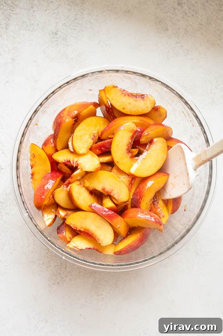 Fresh Peach Cobbler Recipe with Golden Biscuit Topping 6 Fresh sliced peaches tossed with sugar and cornstarch for peach cobbler.