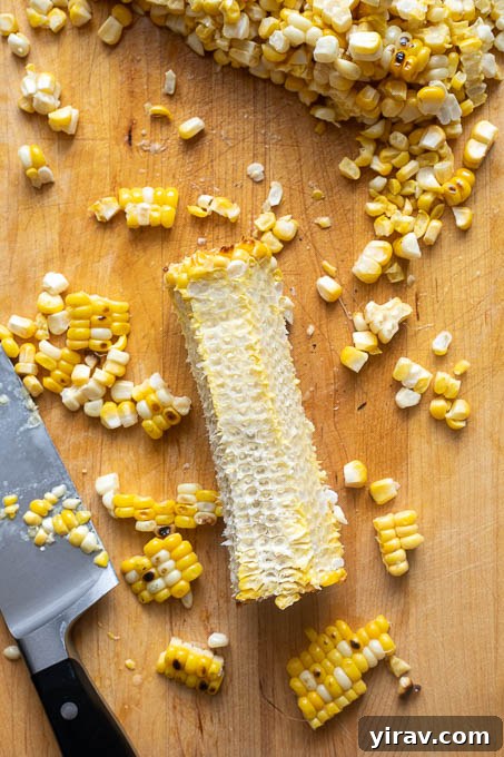 Summer Peach, Tomato and Corn Salad with Basil 5 Grilled corn removed from cob with a sharp knife.