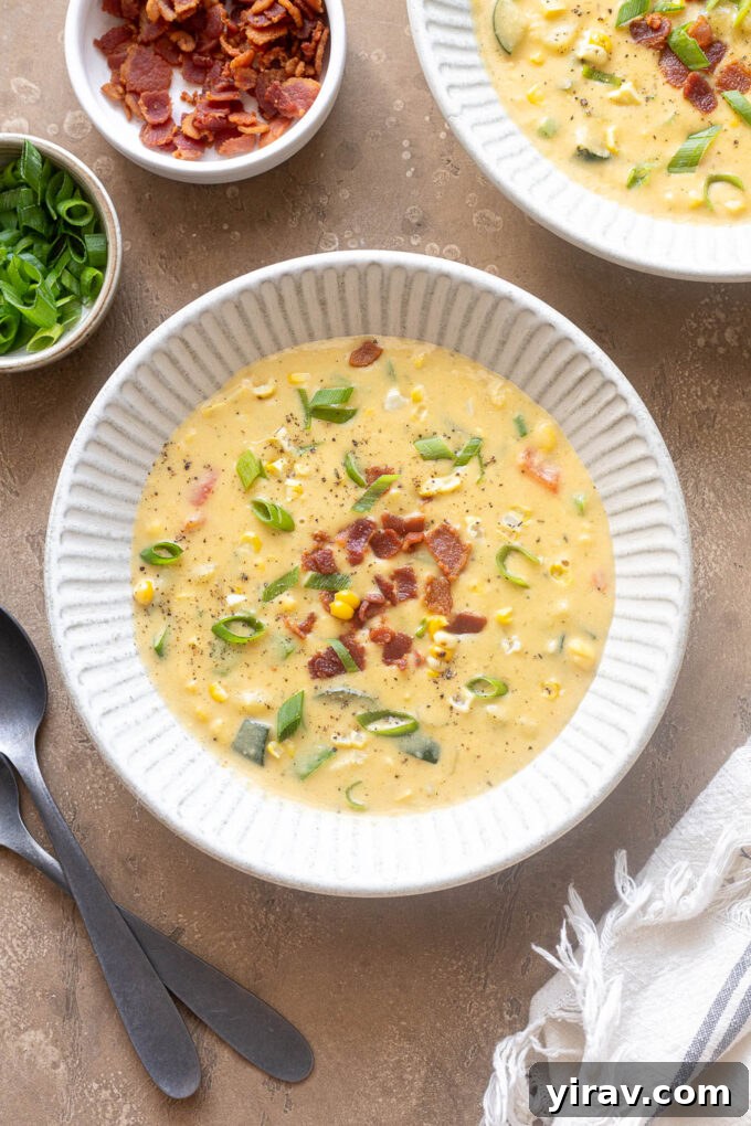 Creamy Zucchini and Corn Chowder with Crispy Bacon 6 Bowl of zucchini corn chowder with bacon, fresh corn and zucchini.